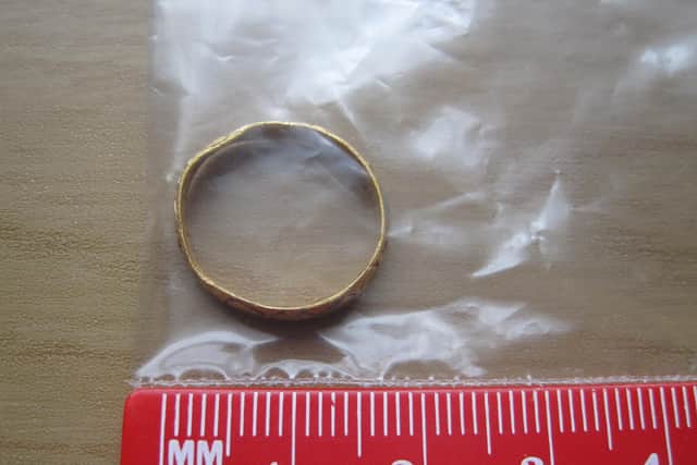 The 400-year-old ring was found in a farmer's field and the discoverer is now waiting to hear if the rare piece of jewellery will be claimed by the National Museum of Scotland. (Photo: Robin Potter / SWNS.COM).