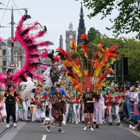 Performers from at least 13 countries paraded along Princes Street during the Edinburgh Festival Carnival (Picture: Andrew Milligan/PA)