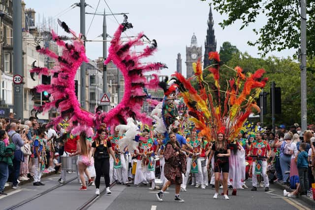 Organisers at Edinburgh Festival Carnival are “optimistic” that an alternative route through the city centre will be found ahead of Sunday’s event due to the ongoing closure on Princes Street (Picture: Andrew Milligan/PA)