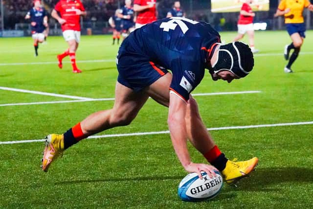 Darcy Graham scores a try for Edinburgh against Munster. He later went off injured.  (Photo by Simon Wootton / SNS Group)