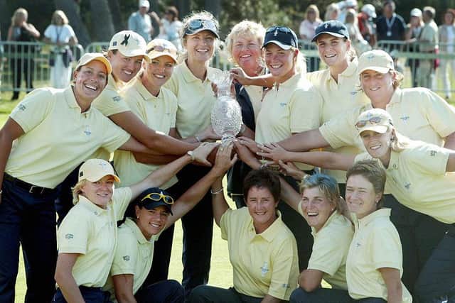 Janice Moodie, far right in middle, celebrates with her European team-mates after winning the 2003 Solheim Cup at Barseback Golf & Country Club in Sweden. Picture: Ola  Torkelsson/AFP via Getty Images.