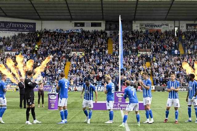 The 2021/2022 Championship winners flag is unfurled during a cinch Premiership match between Kilmarnock and Dundee United. (Photo by Rob Casey / SNS Group)