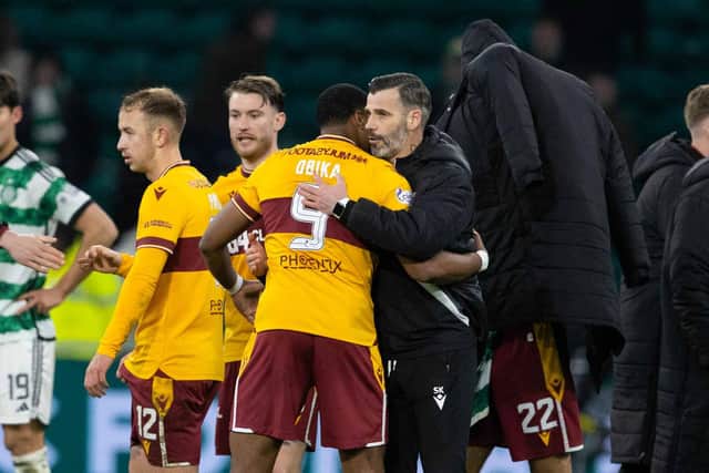 Motherwell's Jonathan Obika and manager Stuart Kettlewell at full-time during a cinch Premiership match at Celtic.