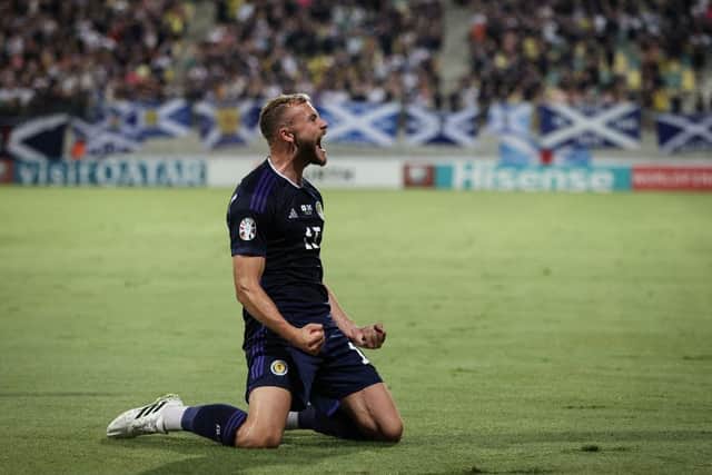 Ryan Porteous celebrates after scoring Scotland's second goal in the win over Cyprus. (Photo by Ryan Pierse/Getty Images)
