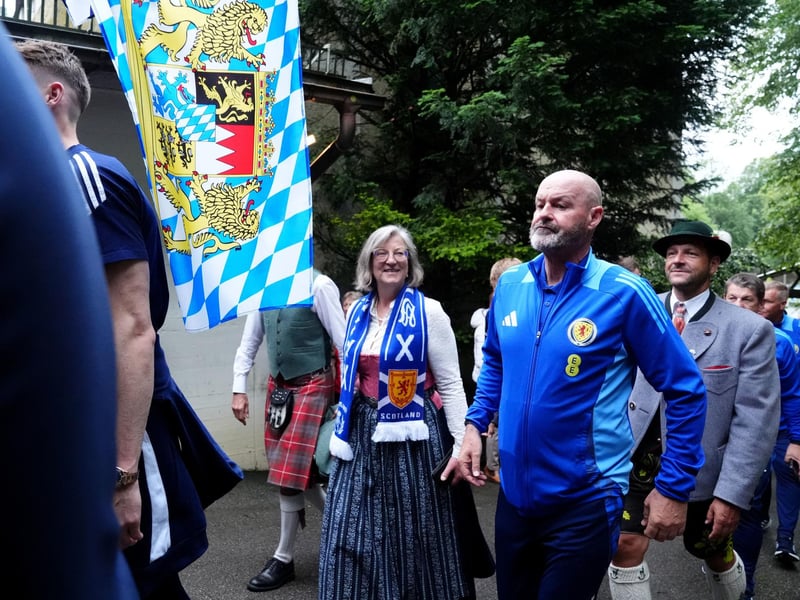 Mayor of Garmisch-Partenkirchen Elizabeth Koch and Scotland manager Steve Clarke make their way to a reception at Bayernhalle in Garmisch-Partenkirchen, Germany.