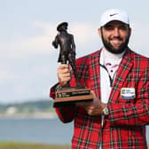 Scottie Scheffler celebrates with the trophy and the tartan jacket after winning the RBC Heritage at Harbour Town Golf Links in Hilton Head Island, South Carolina. Picture: Andrew Redington/Getty Images.