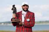 Scottie Scheffler celebrates with the trophy and the tartan jacket after winning the RBC Heritage at Harbour Town Golf Links in Hilton Head Island, South Carolina. Picture: Andrew Redington/Getty Images.