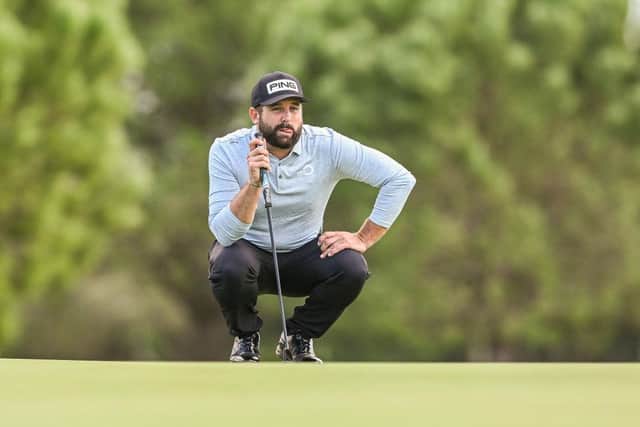 Matthew Baldwin lines up a putt at Club de Golf Alcanada in Alcudia en route to securing a share of the halfway lead. Picture: Octavio Passos/Getty Images.