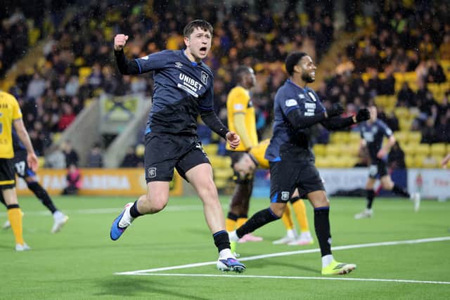 Rangers' Mikey Moore celebrates after levelling the scores against Livingston on Sunday.