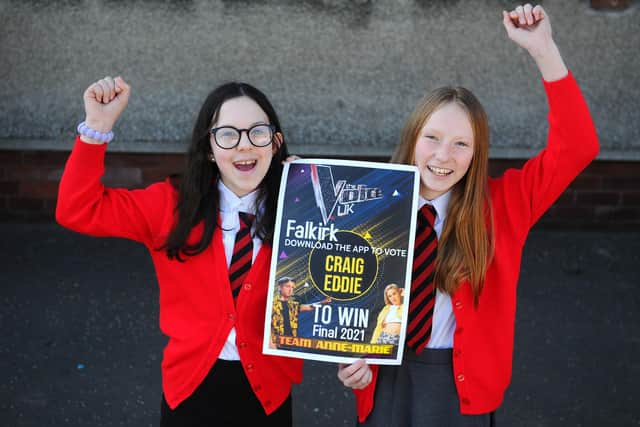 Primary 7 Room 16 pupils at St Francis Xavier's Primary School, Falkirk are backing New Carron man and alumni Craig Eddie to win The Voice. Picture: Michael Gillen.