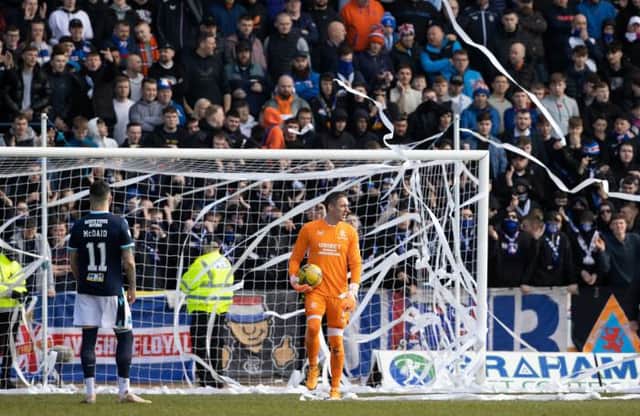 Play was stopped for the third time in the match at Dens Park on Sunday when Rangers fans again threw toilet rolls into the goalmouth. (Photo by Alan Harvey / SNS Group)