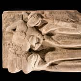 The carving shows a much smaller figure complete with gash wound and hanging entrails and is believed to be the assasin of the abbot. PIC: HES.