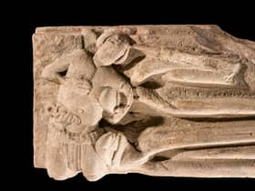 The carving shows a much smaller figure complete with gash wound and hanging entrails and is believed to be the assasin of the abbot. PIC: HES.