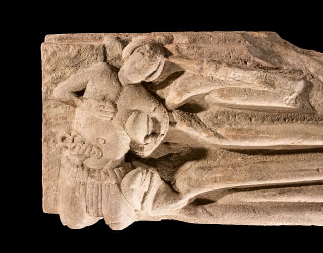 The carving shows a much smaller figure complete with gash wound and hanging entrails and is believed to be the assasin of the abbot. PIC: HES.