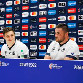 Scotland prop Zander Fagerson, right, with team-mates Jamie Ritchie, left, and Rory Darge at a press conference at the Velodrome stadium in Marseille ahead of the France 2023 Rugby World Cup.   (Photo by CLEMENT MAHOUDEAU/AFP via Getty Images)
