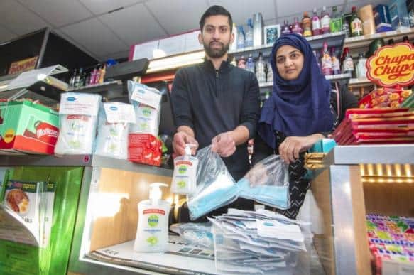 Asiyah Javed, 34, and her husband Jawad, 35, run the Day Today Express convenience store in Stenhousemuir, Falkirk.