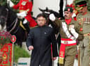 Pakistan's former president Pervez Musharraf (left) walks down after taking the oath as a civilian president at the presidential palace in Islamabad. Picture: Aamir Qureshi/AFP via Getty Images