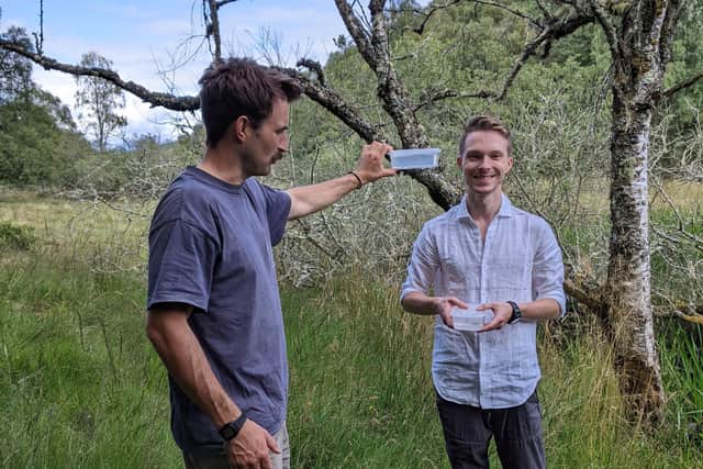 Fred Swift and Danny O'Brien working on a great crested newt translocation project as part of the West Loch Ness Farm Cluster