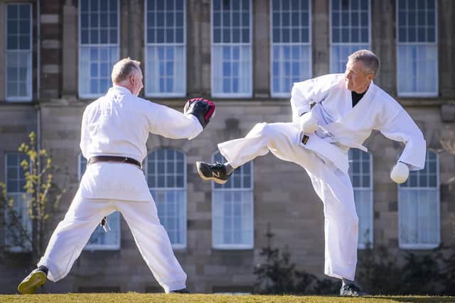 Scottish Liberal Democrat Leader Willie Rennie (right) takes part in a karate lesson with Robert Steggles at The Meadows in Edinburgh. Picture: Jane Barlow/PA Wire