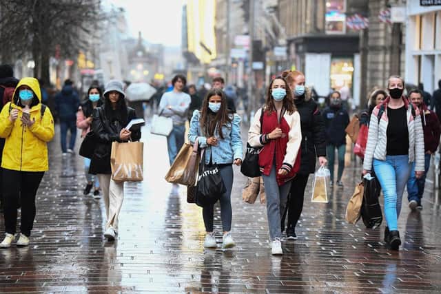 Watch as Glasgow shoppers and retailers react as the city is placed in Level 4 of Scotland’s regional lockdown system. (Photo by Jeff J Mitchell/Getty Images)