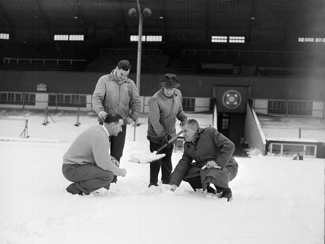 A pitch inspection at Tynecastle stadium with Hearts manager Tommy Walker and Jack Jeans that led to the New Year Derby game to be cancelled in 1962.