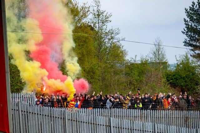 Partick Thistle supporters gathered outside Firhill celebrate as their team secure promotion to the Scottish Championship. (Photo by Craig Foy / SNS Group)
