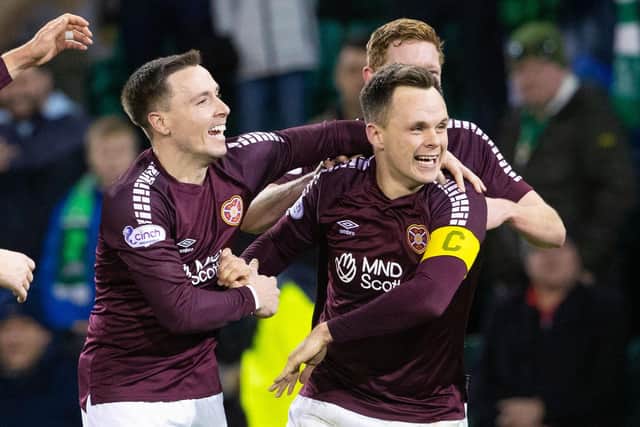 Hearts' Lawrence Shankland celebrates with Barrie McKay and Kye Rowles after making it 1-0 during a cinch Premiership match between Hibernian and Heart of Midlothian at Easter Road, on December 27, 2023, in Edinburgh, Scotland. (Photo by Alan Harvey / SNS Group)