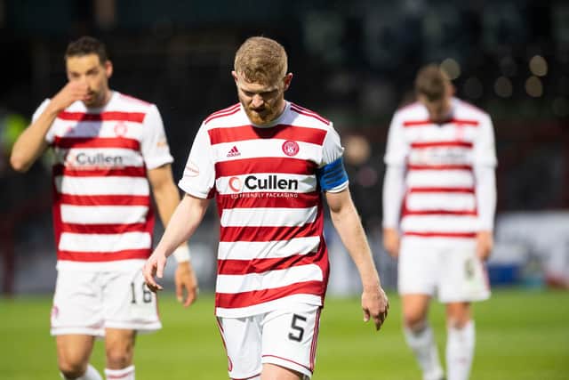 A dejected Brian Easton walks off the park at full-time. Picture: SNS