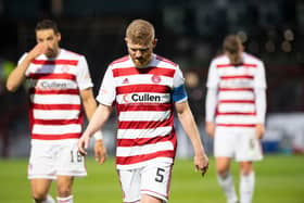 A dejected Brian Easton walks off the park at full-time. Picture: SNS