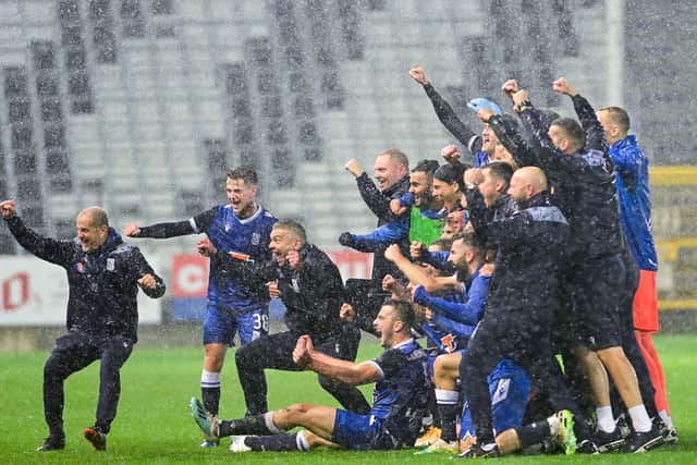 Lech celebrate after winning their Europa League play-off with Sporting Charleroi  (Photo by LAURIE DIEFFEMBACQ/BELGA MAG/AFP via Getty Images)
