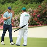 Brooks Koepka reacts to his eagle on the 13th green with caddie Ricky Elliott during the final round of the 2019 Masters at Augusta National. Picture: Andrew Redington/Getty Images