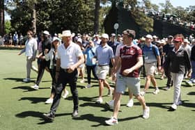 Greg Norman of Australia, CEO and Commissioner of LIV Golf, walks with patrons during the 88th Masters at Augusta National Golf Club. Picture: Warren Little/Getty Images.