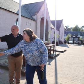 Councillor Blackett with a Braemar tour guide at the village's new Top up Tap.