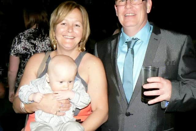 Lex Warner, pictured on his 50th birthday, with his wife Debbie and their son Vincent