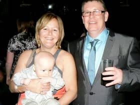 Lex Warner, pictured on his 50th birthday, with his wife Debbie and their son Vincent
