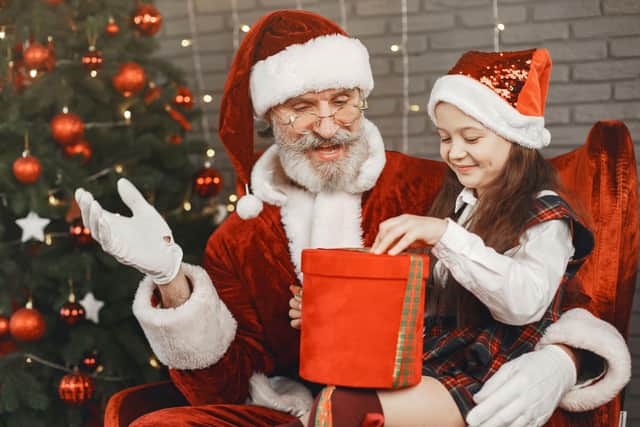 Meet Santa and come away with a festive gift all of your own. Photo: Yuganov Konstantin / Canva Pro.