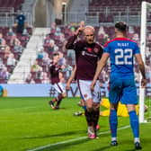 Liam Boyce's fine finish puts Hearts 2-0 ahead against Inverness.