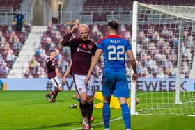 Liam Boyce's fine finish puts Hearts 2-0 ahead against Inverness.
