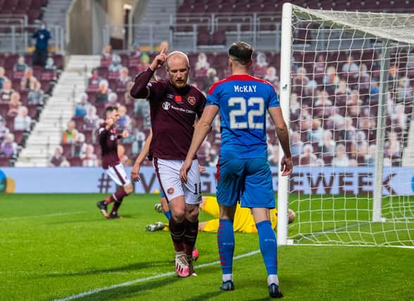 Liam Boyce's fine finish puts Hearts 2-0 ahead against Inverness.