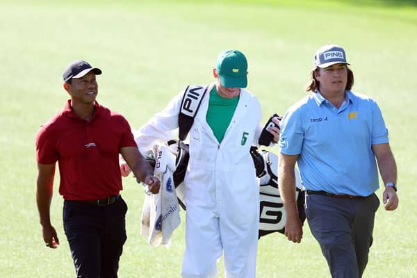 Tiger Woods and amateur Neal Shipley walk on the third hole at Augusta National Golf Club. Picture: Andrew Redington/Getty Images.