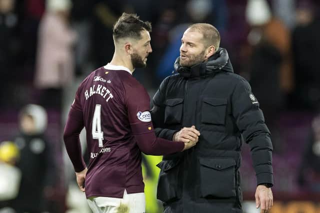 Hearts defender Craig Halkett, who started his first match since September in the 3-1 win over Kilmarnock on Saturday, with manager Robbie Neilson at full-time. (Photo by Roddy Scott / SNS Group)