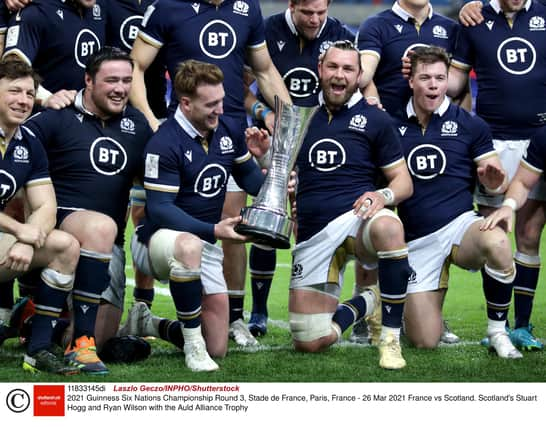 Ryan Wilson, right, lifted the Auld Alliance Trophy with Scotland captain Stuart Hogg. Picture: Laszlo Geczo/INPHO/Shutterstock