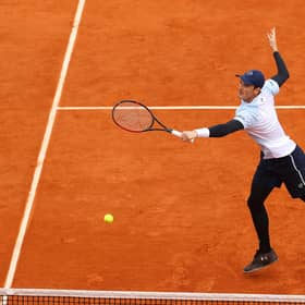 Jamie Murray plays a backhand during the men's doubles quarter-final defeat by Kevin Krawietz and Andreas Mies of Germany.