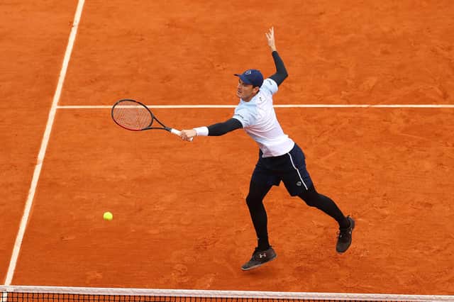 Jamie Murray plays a backhand during the men's doubles quarter-final defeat by Kevin Krawietz and Andreas Mies of Germany.