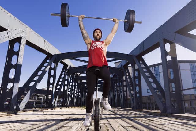 Jason Auld who achieved the Guinness World Record (GWR) for the heaviest single weight (68kg) lifted by barbell overhead press while riding a unicycle