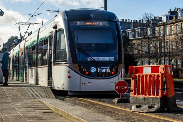 A tram in the west end of Edinburgh during work on the tram line extension between the city centre and Newhaven, which opened in June. (Photo by Lisa Ferguson/The Scotsman)
