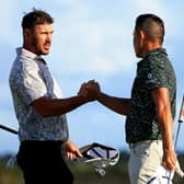 Brooks Koepka, left, and Collin Morikawa shake hands during the final round of the 2021 Hero World Challenge at Albany Golf Course in Nassau. Picture: Mike Ehrmann/Getty Images.