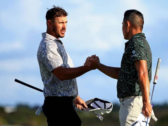 Brooks Koepka, left, and Collin Morikawa shake hands during the final round of the 2021 Hero World Challenge at Albany Golf Course in Nassau. Picture: Mike Ehrmann/Getty Images.