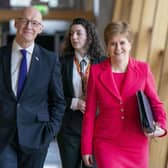 First Minister Nicola Sturgeon and Deputy First Minister John Swinney (left) arrive for First Minster's Questions. Picture: Jane Barlow/PA Wire