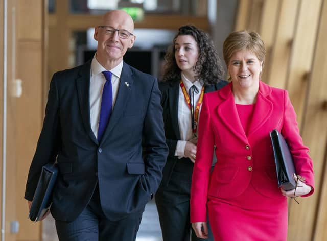First Minister Nicola Sturgeon and Deputy First Minister John Swinney (left) arrive for First Minster's Questions. Picture: Jane Barlow/PA Wire